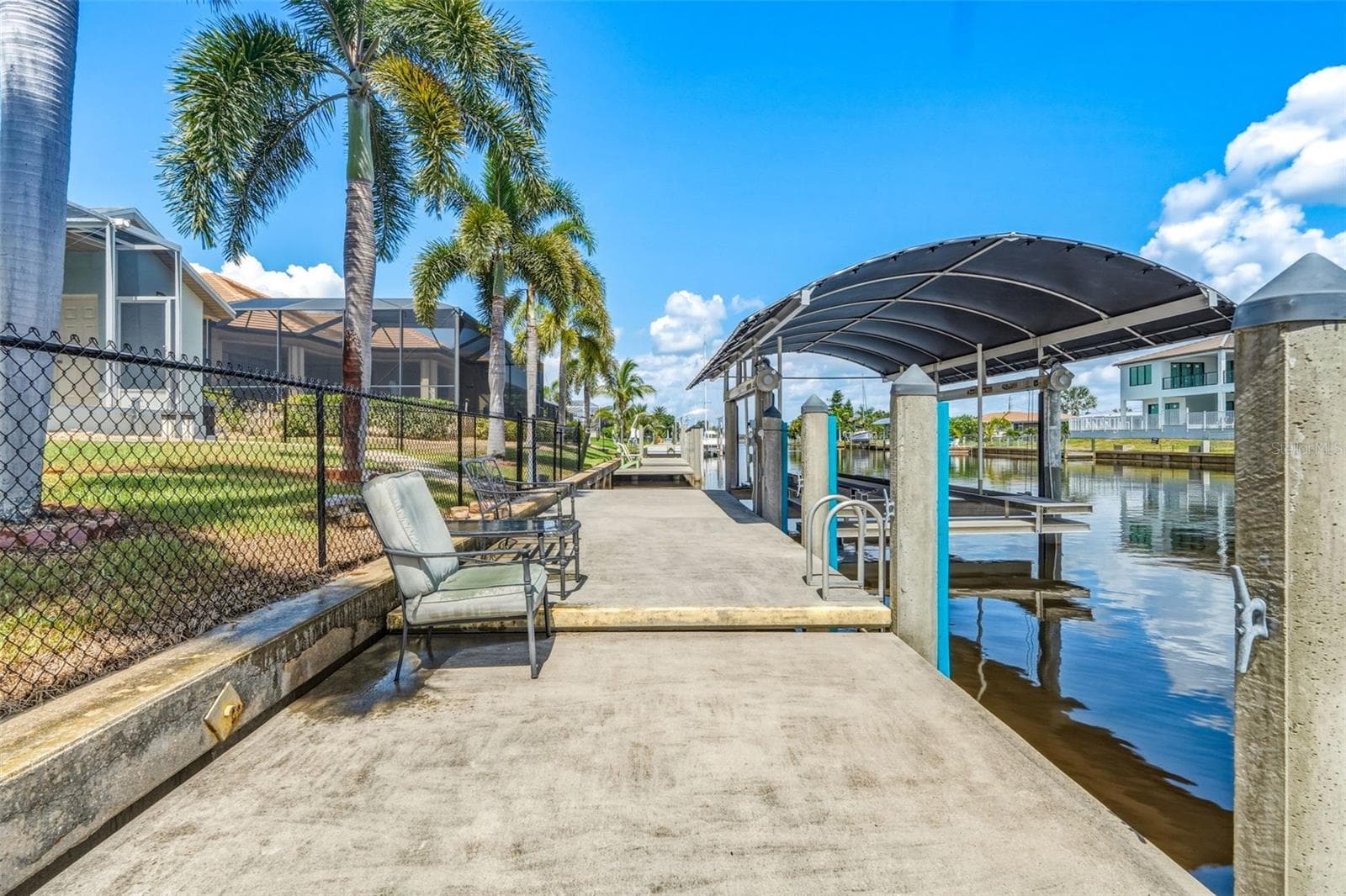 Boaters Dream Large Dock with Covered Boat Lift - 136 PECKHAM ST SE, PORT CHARLOTTE