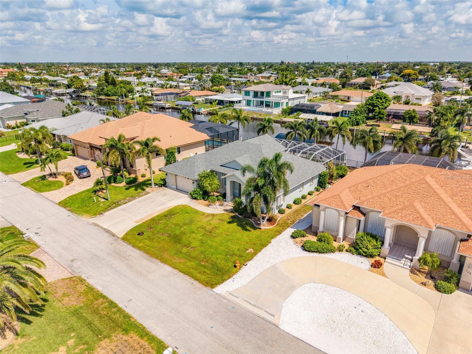 Aerial View of Home & Surrounding Neighborhood - 136 PECKHAM ST SE, PORT CHARLOTTE