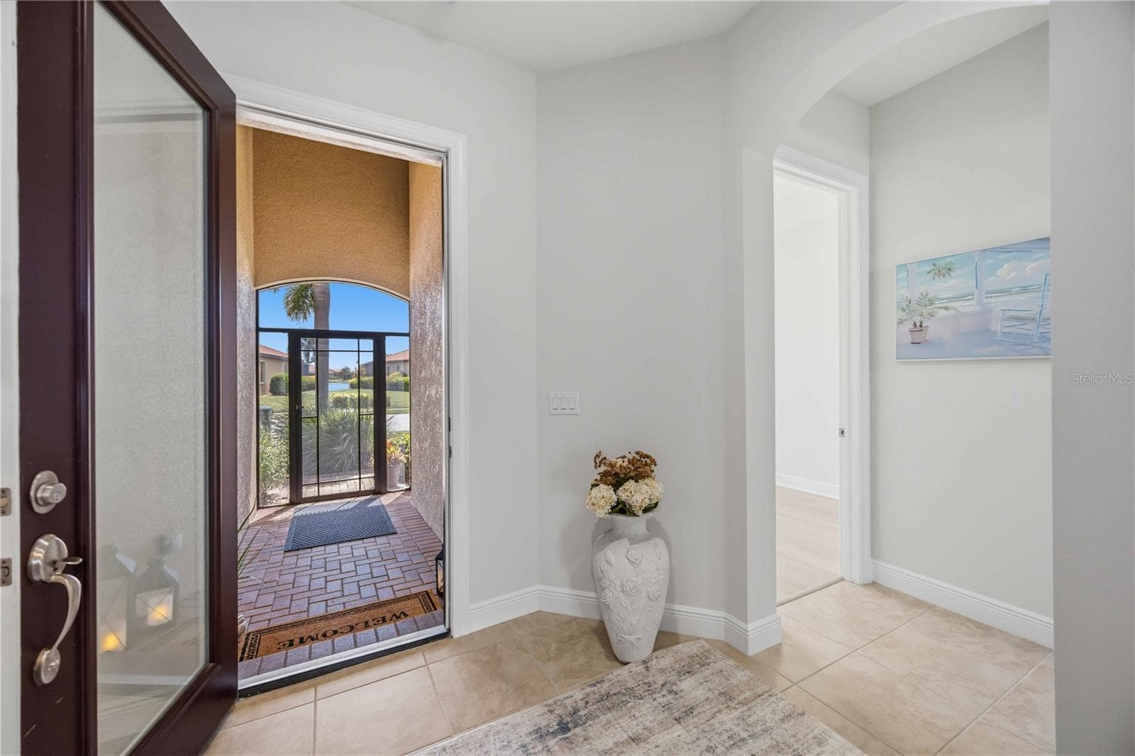The entry area in this home is large and welcoming - 23781 WAVERLY CIR, VENICE