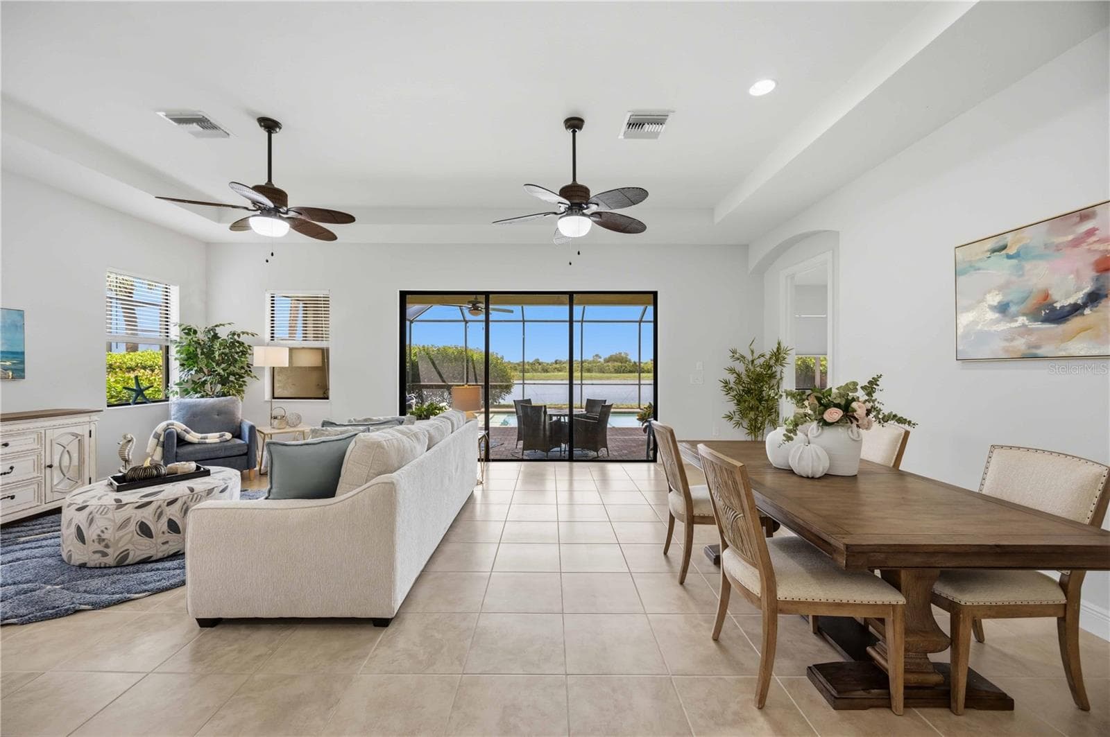 he living /great room in this home shares space with the dining area - - 23781 WAVERLY CIR, VENICE