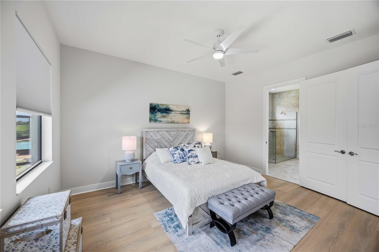 he primary bedroom is large and will easily accomodate a king sized bed and nightstands and dresser - 23781 WAVERLY CIR, VENICE