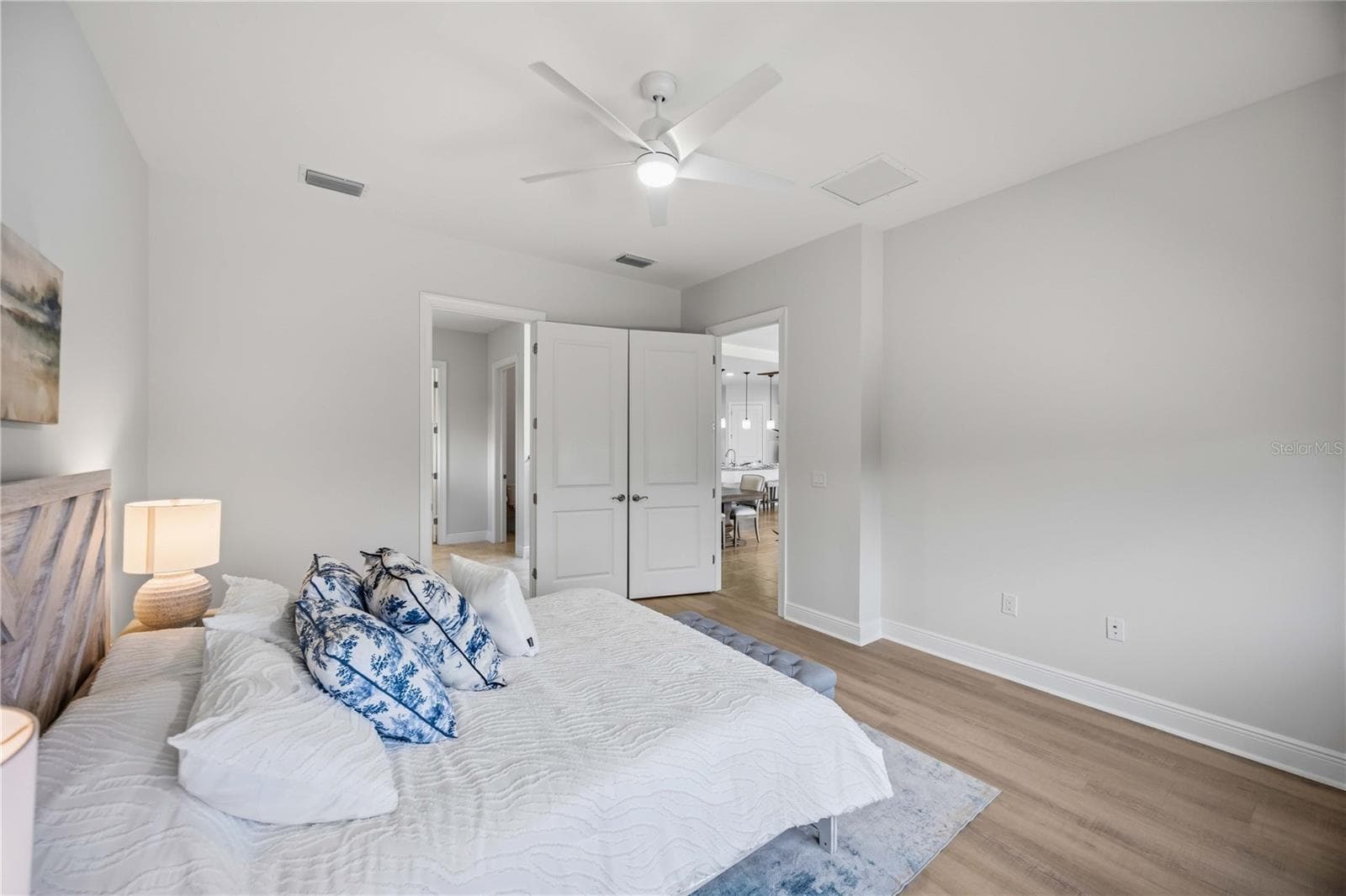 he primary bedroom is large and will easily accomodate a king sized bed and nightstands and dresser - 23781 WAVERLY CIR, VENICE