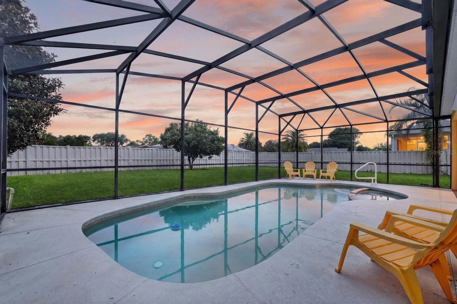 Screen Enclosed Heated Pool with Spa - 100 FLAMINGO DR, PALM COAST