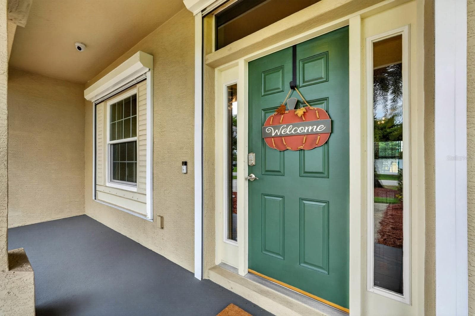 Front door and porch - 100 FLAMINGO DR, PALM COAST