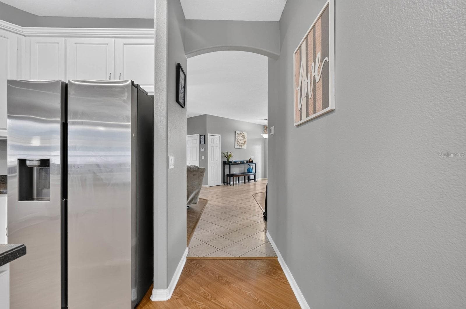 Kitchen looking into front living areas - 100 FLAMINGO DR, PALM COAST