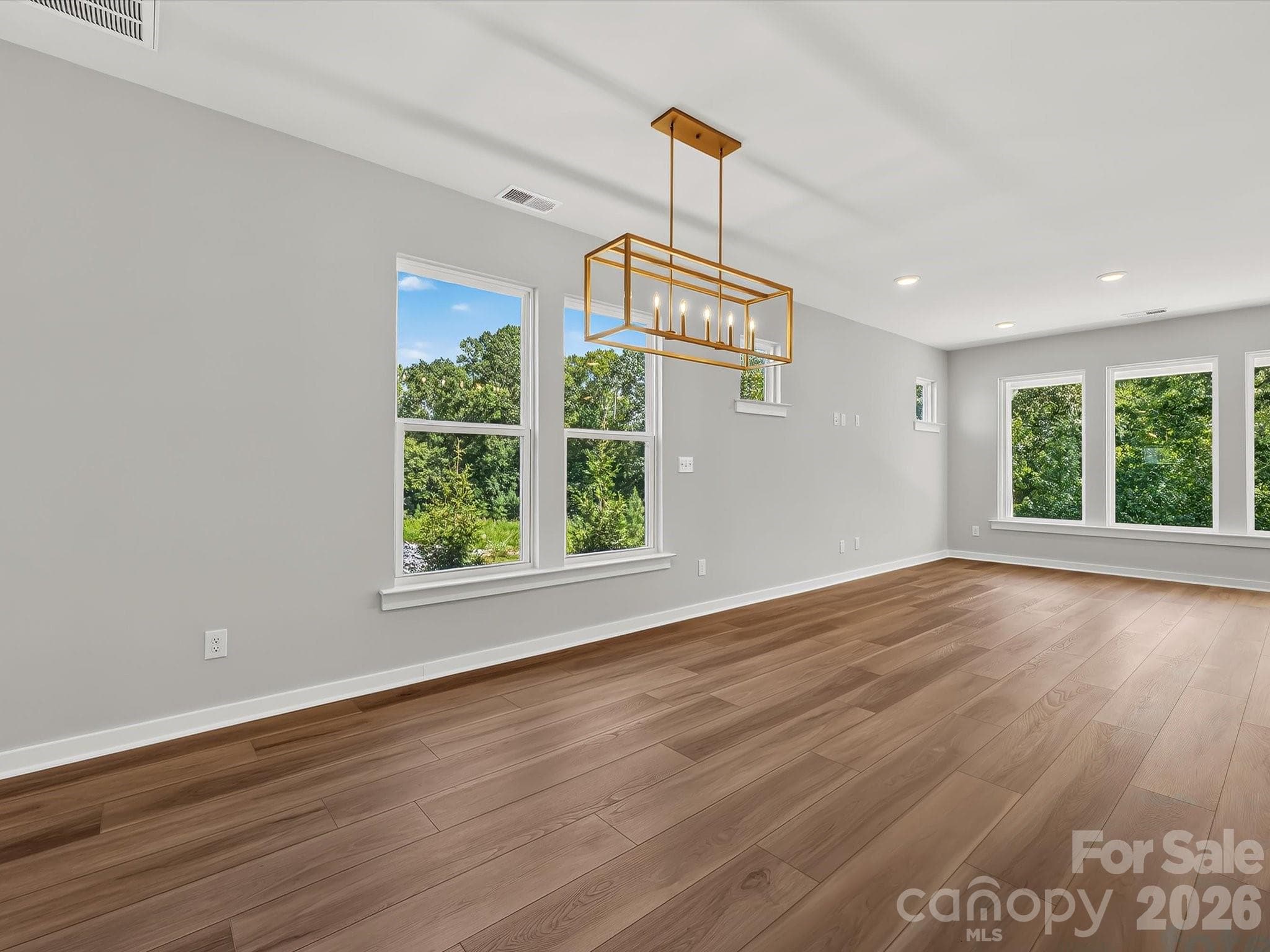 9' LVP flooring throughout the main floor - 284 Alluvium Lane, Waxhaw