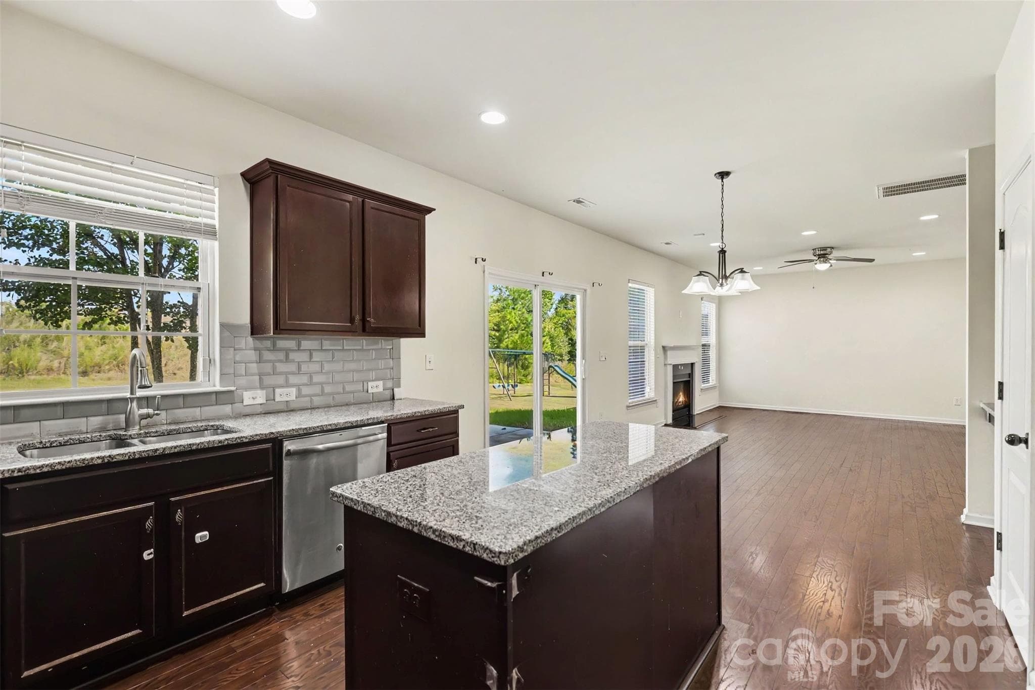 Single Family Residence at 10704 Sky Chase Avenue NW, Concord, photo 6 of 36