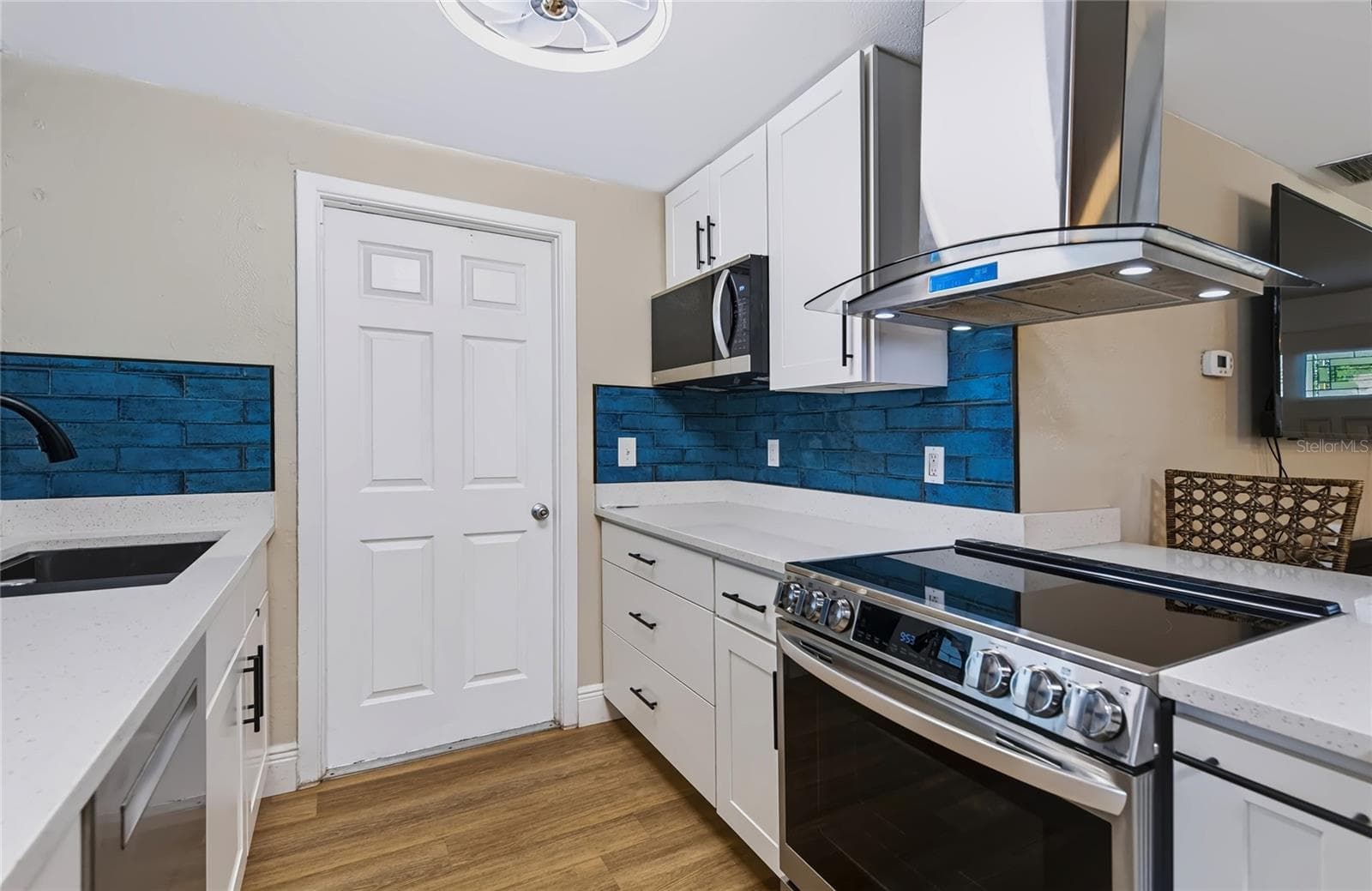 Single Family Residence at 9029 LEISURE LN N, LARGO, photo 12 of 53