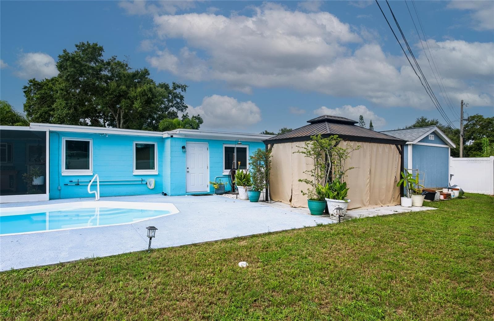 Single Family Residence at 9029 LEISURE LN N, LARGO, photo 52 of 53