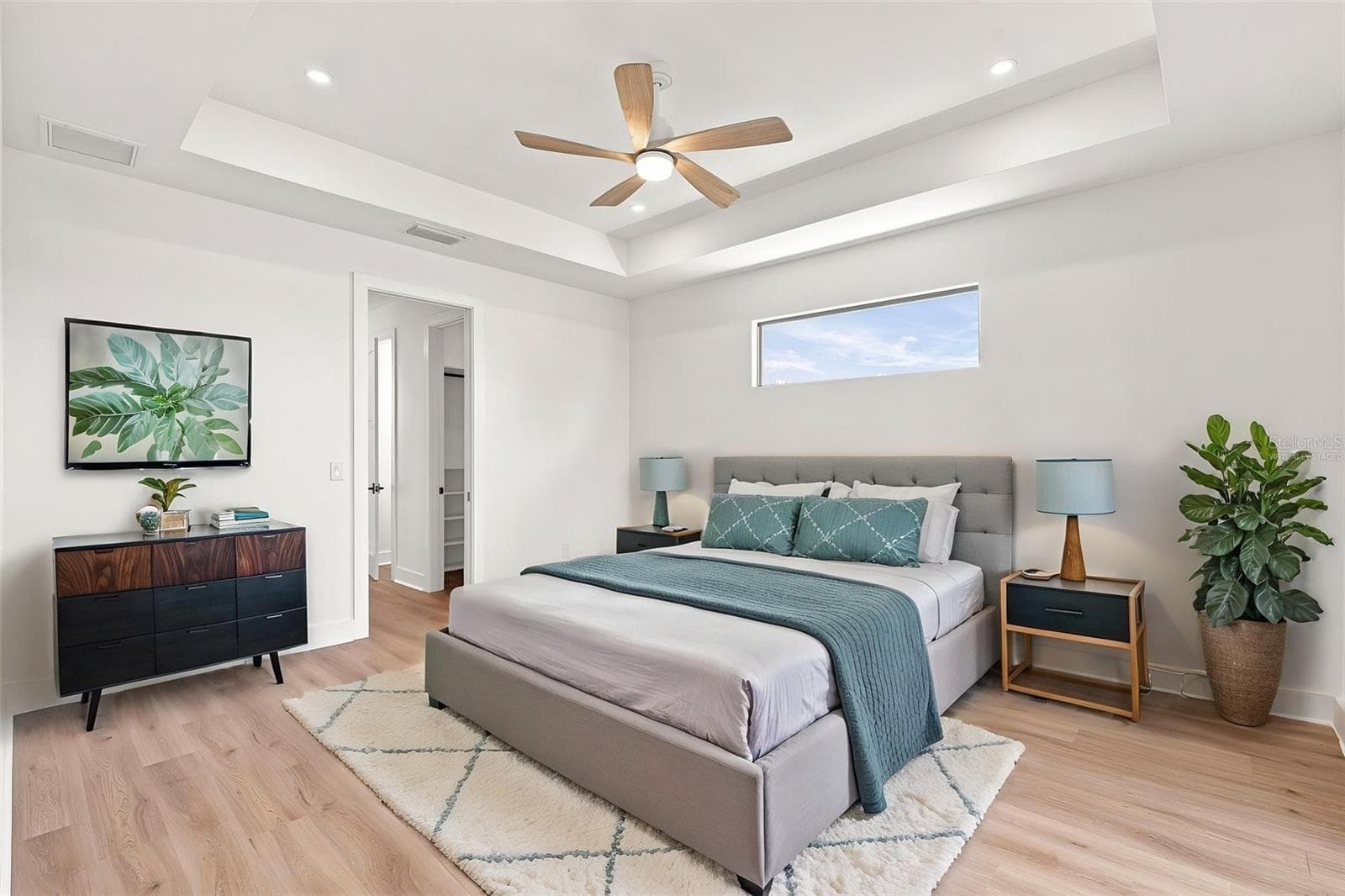Virtually Staged Primary Suite with Tray Ceiling & Ensuite Access - 44 SUNFLOWER DR, PLACIDA