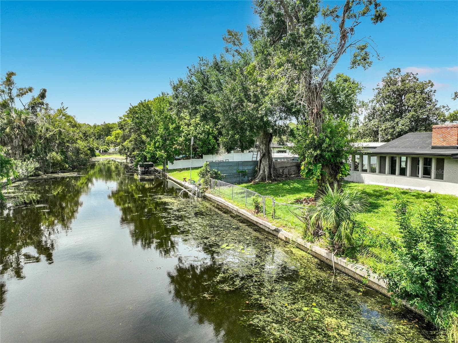 Your backyard canal connection—a unique feature that sets this home apart. - 3202 TRADEWINDS TRL, ORLANDO
