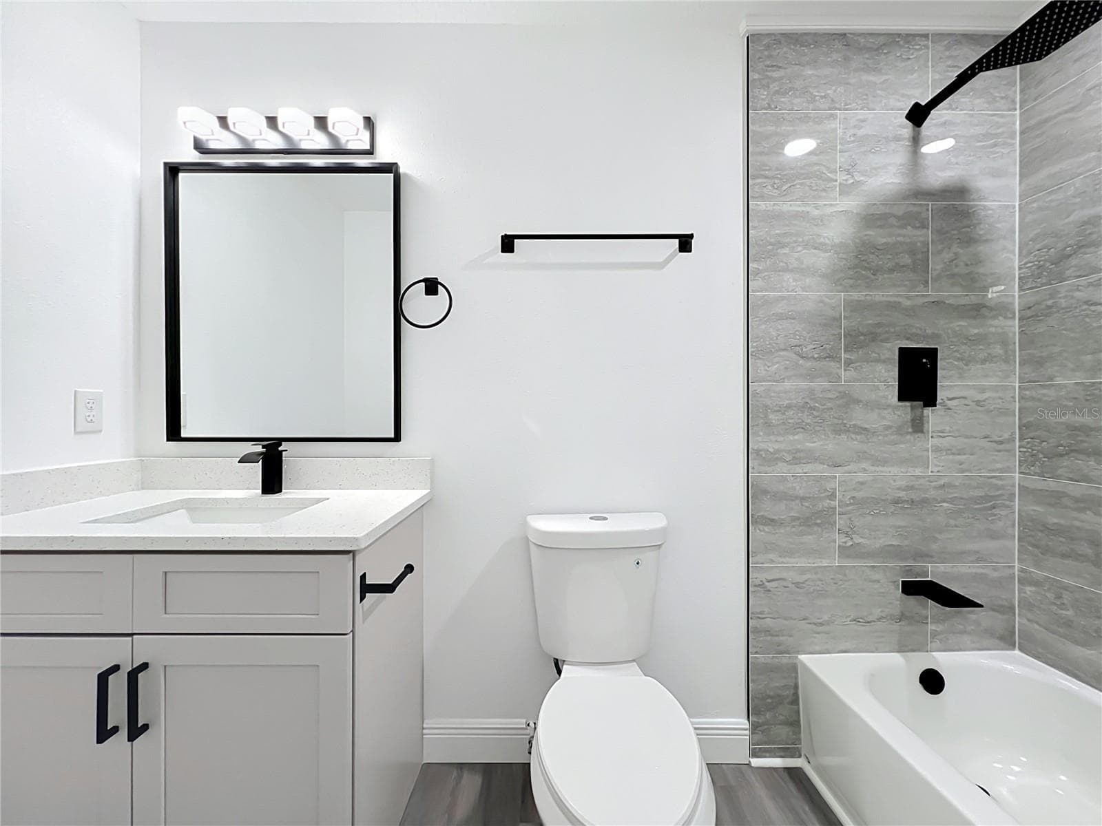 Modern finishes continue with a clean, contemporary bathroom design. - 3202 TRADEWINDS TRL, ORLANDO