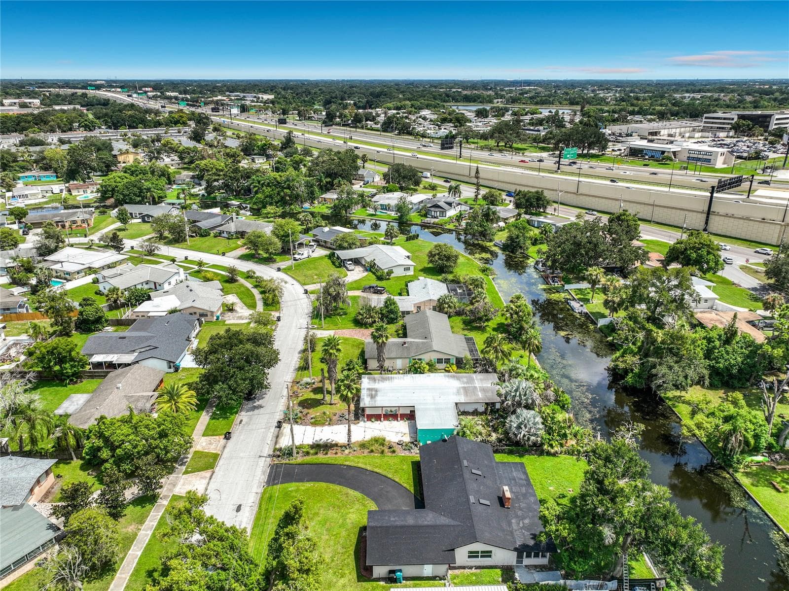 One final aerial view capturing the home, neighborhood and surrounding Orlando area. - 3202 TRADEWINDS TRL, ORLANDO