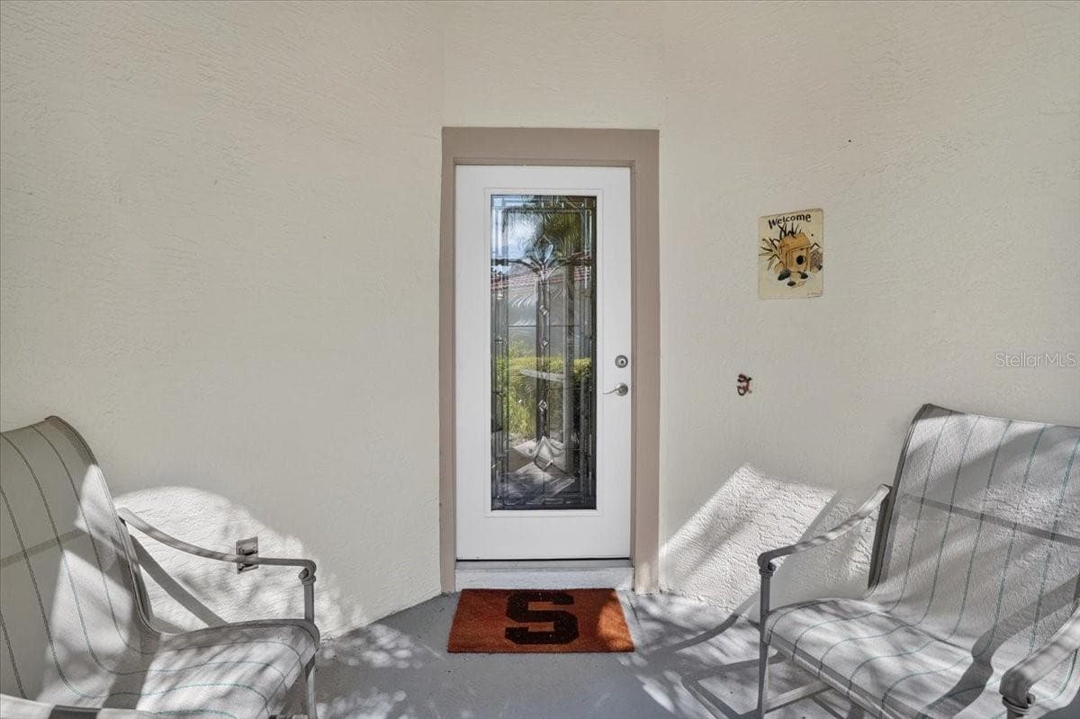 enclosed front door entrance - 7165 MELROSE PL, BRADENTON