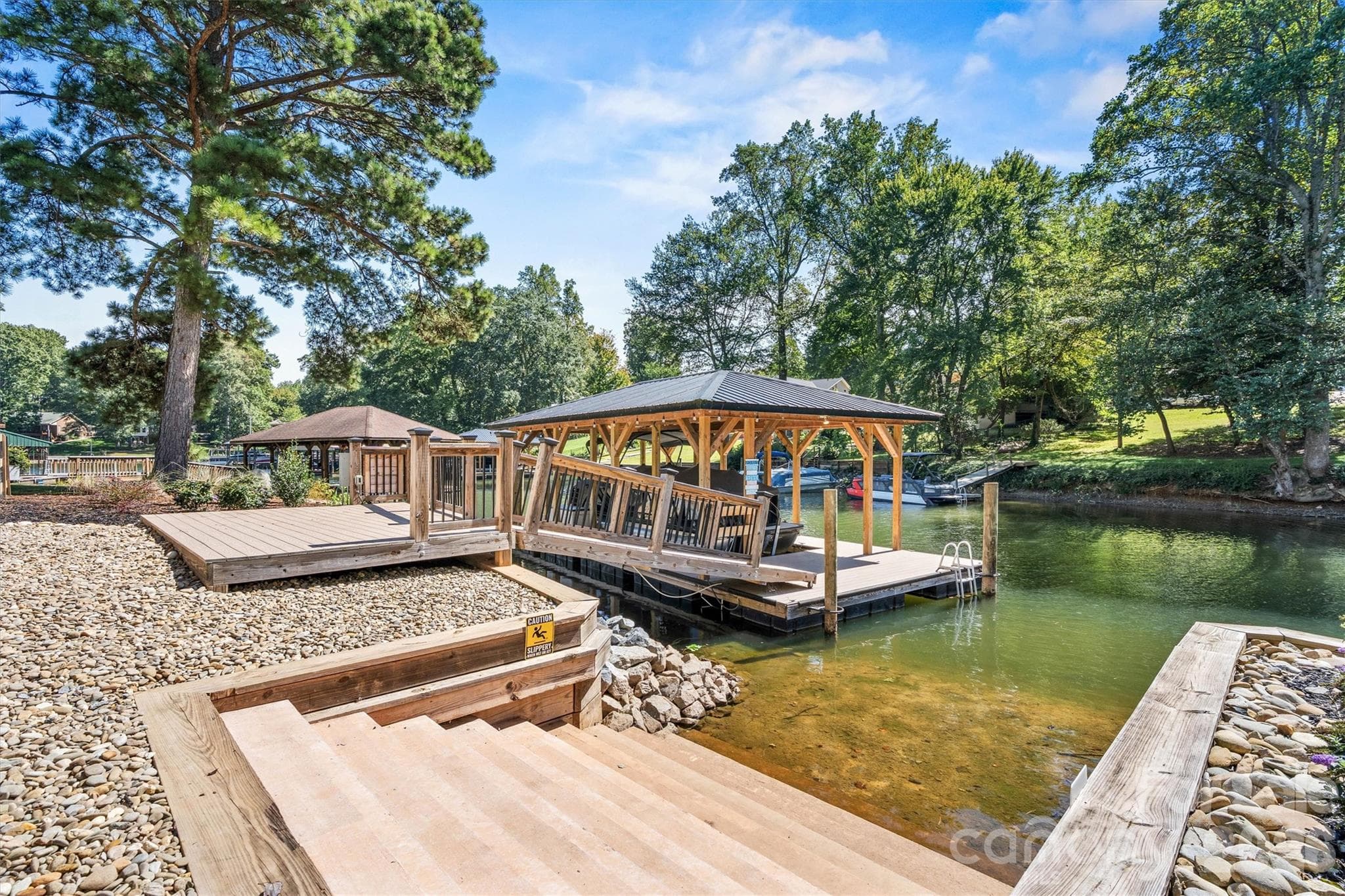 Easy entry into/out of the lake for family, guests, and pets! - 7834 Green Cove Court, Denver