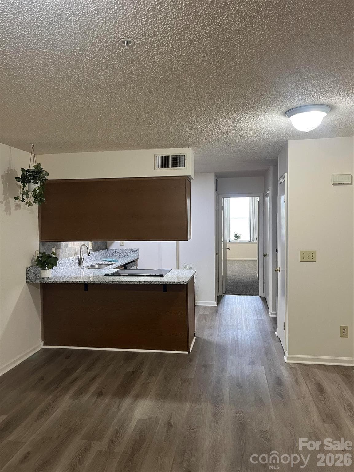 Condominium at 1 Buffalo Avenue NW, Concord, photo 8 of 28