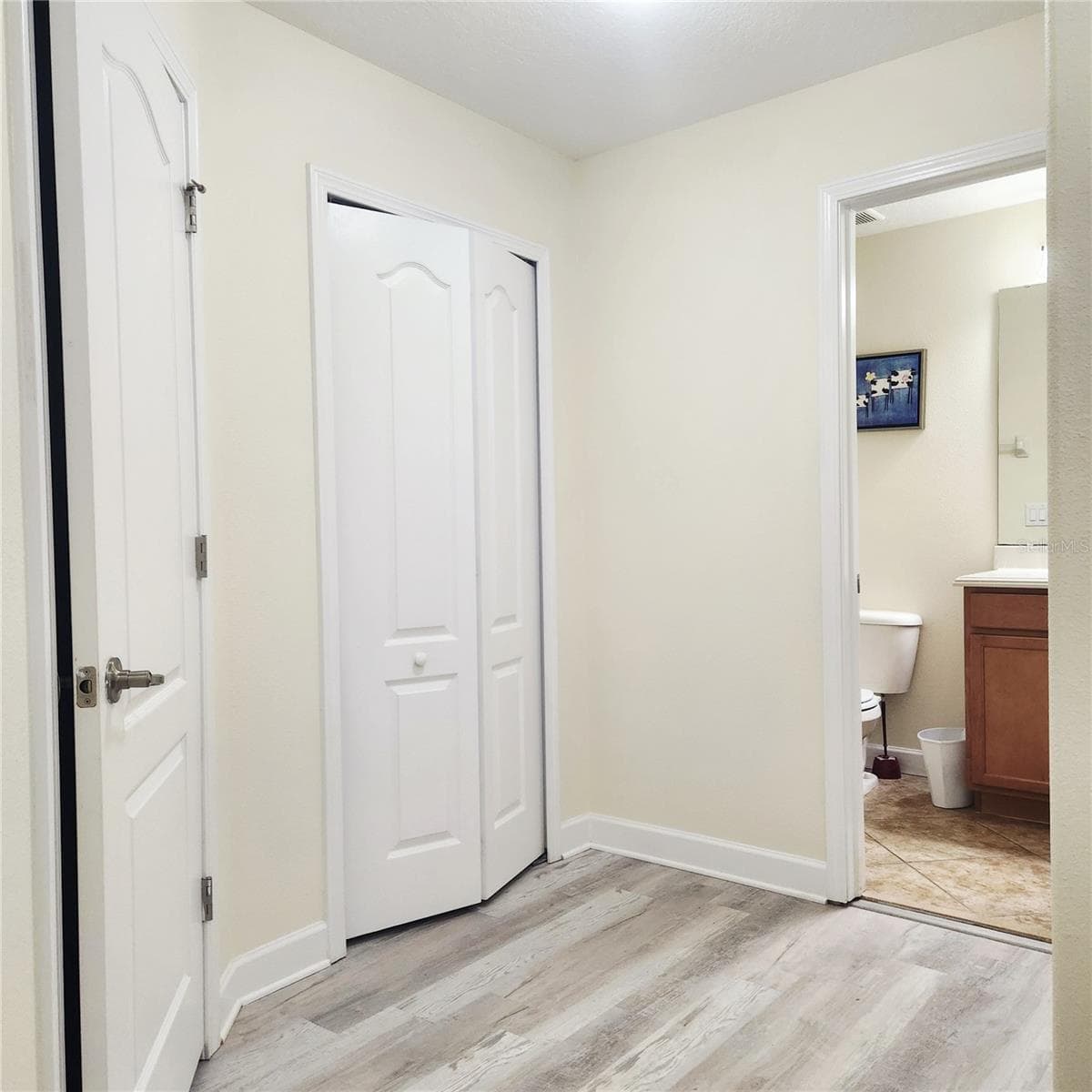 Upstairs hallway leading to the bathroom - 8935 CUBAN PALM RD, KISSIMMEE