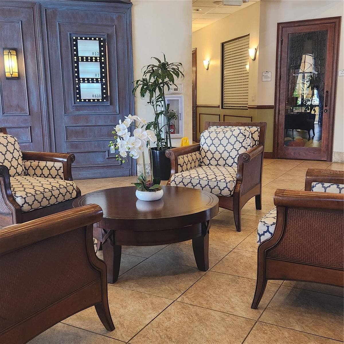Sitting area in clubhouse - 8935 CUBAN PALM RD, KISSIMMEE