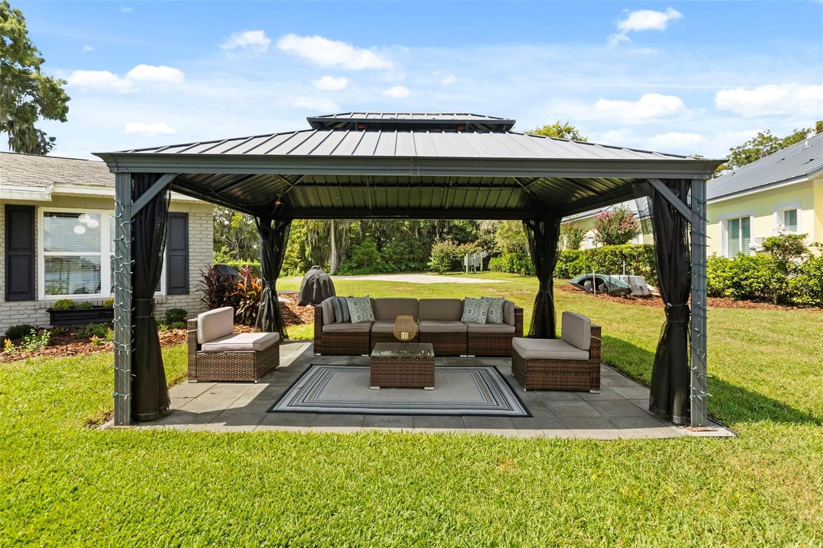 Lake Cottage Lane, featuring an oversized homesite, expansive Lake Sheen views, sandy shoreline, private dock and boatlift, and an existing 2BR/1.5BA lake cottage that can be enjoyed today while you plan the lakefront estate of your dreams. - 10430 LAKE COTTAGE LN, ORLANDO