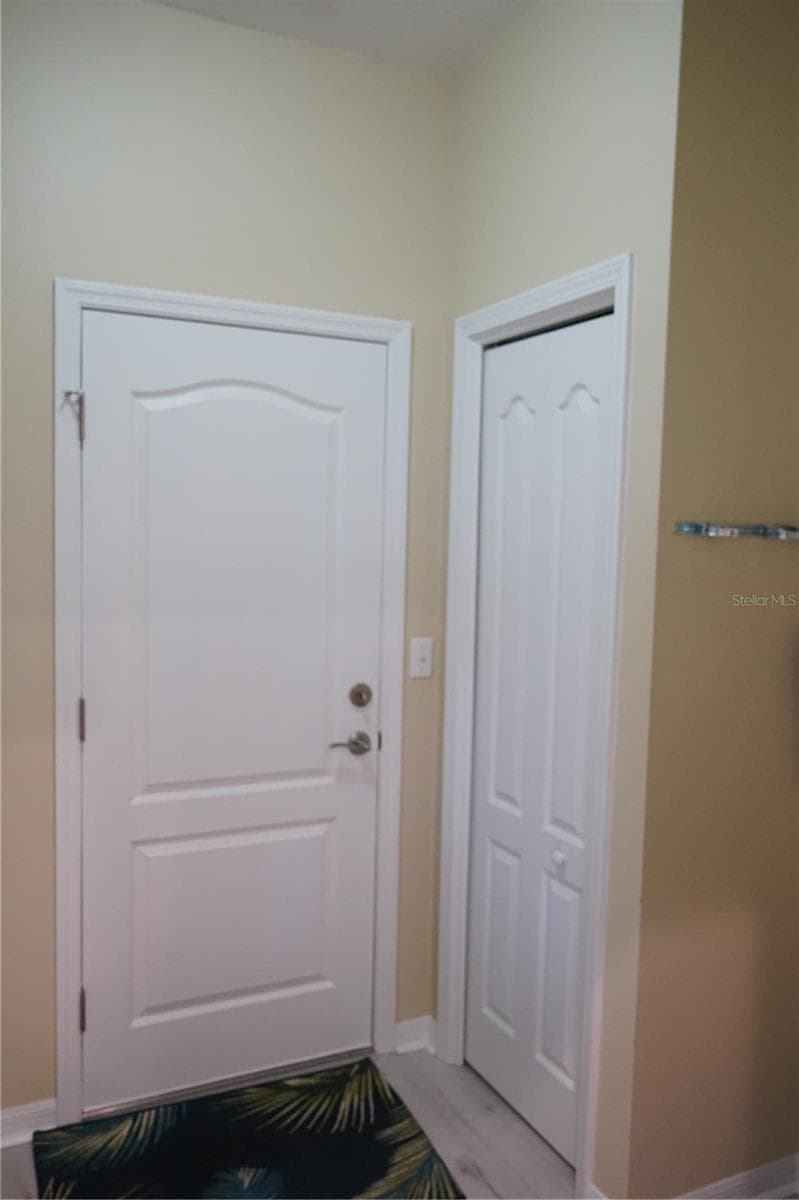 laundry has a closet for storage, door to garage and space for a wet sink to be added - 2032 INVERNESS GREENS DR #76, SUN CITY CENTER