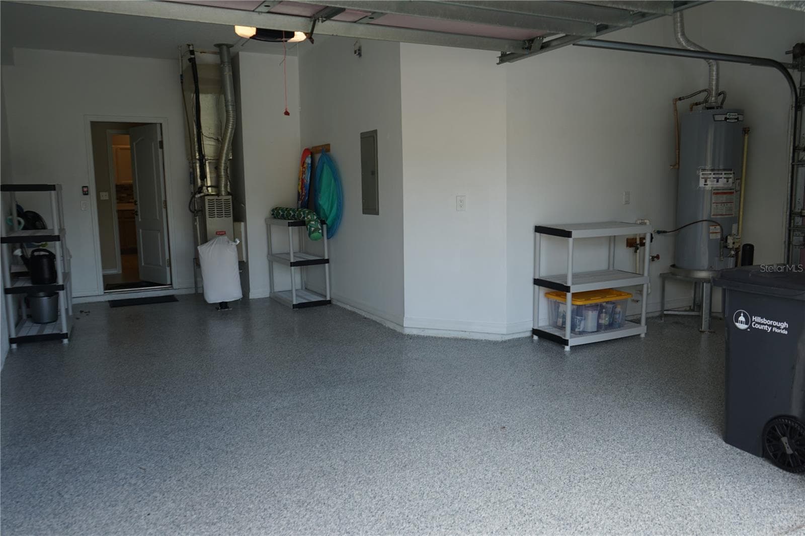 1 car garage with space for a golf cart - 2032 INVERNESS GREENS DR #76, SUN CITY CENTER