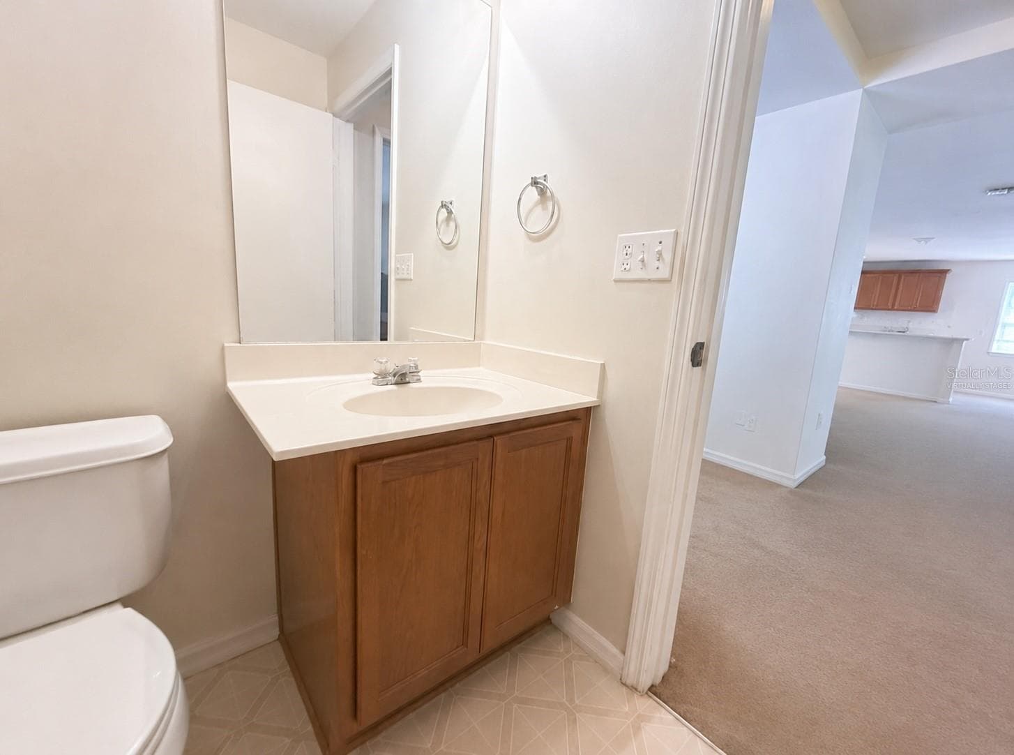 Downstairs half bathroom. Virtually staged - 21468 DAWSON AVE, PORT CHARLOTTE