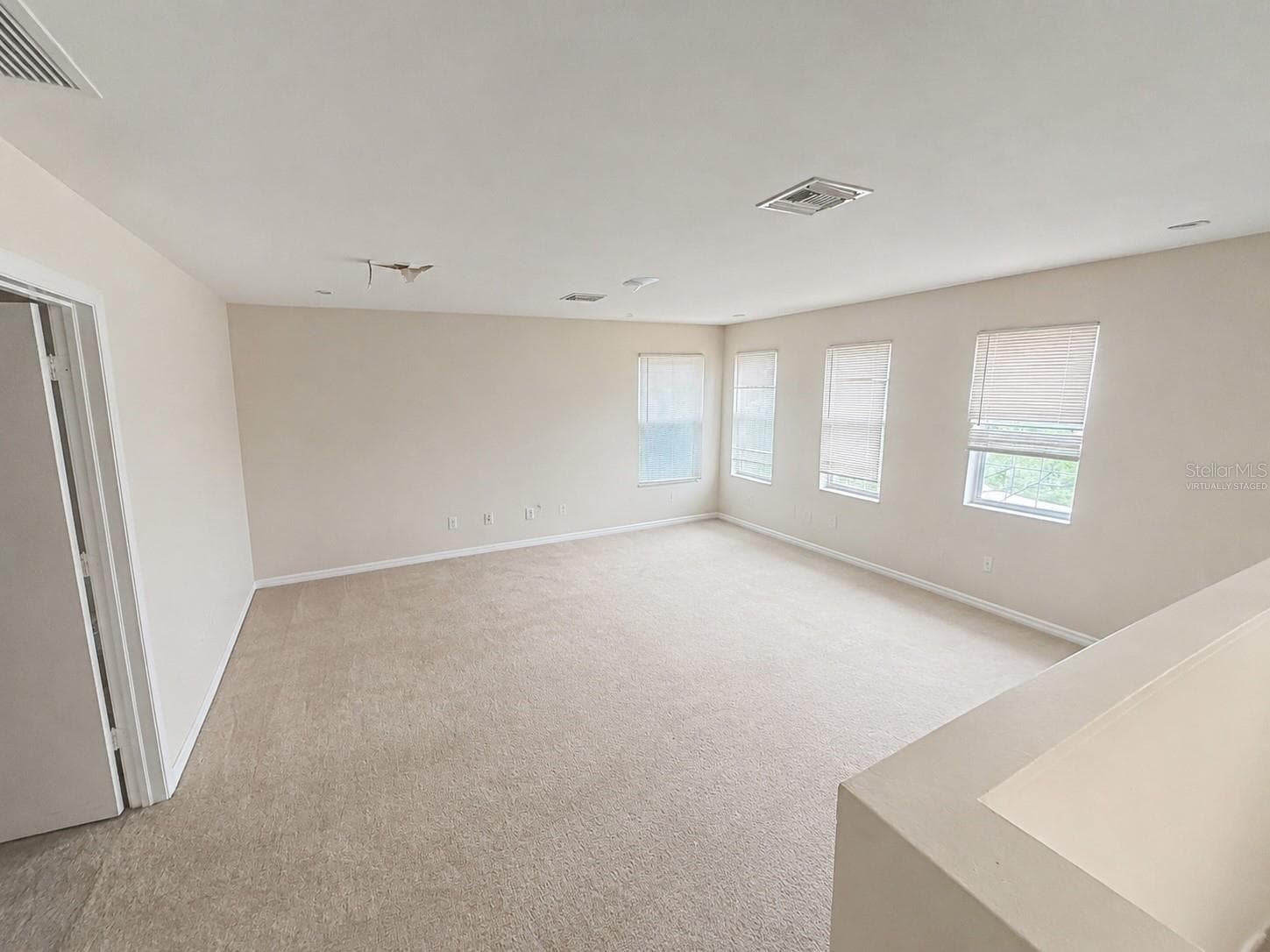 Upstairs playroom. Virtually staged - 21468 DAWSON AVE, PORT CHARLOTTE