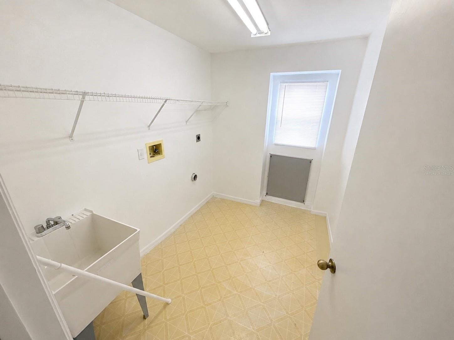 Laundry room. Virtually staged - 21468 DAWSON AVE, PORT CHARLOTTE