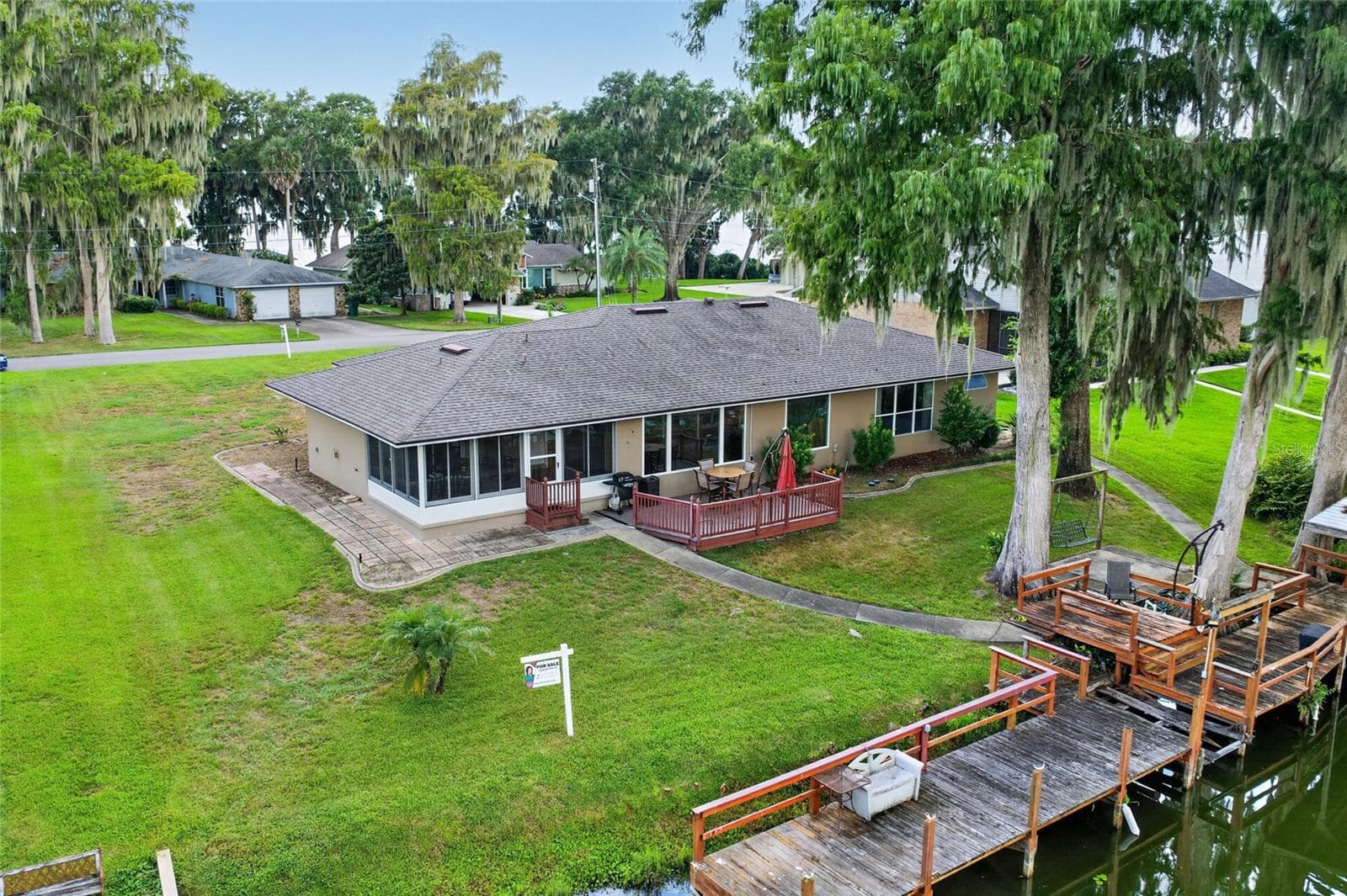 Back yard with dock - 235 TEMPLE CIR, EUSTIS