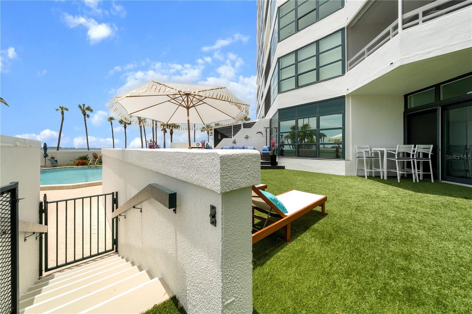 PRIVATE GATE DOWN TO AMENITIES...POOL, SAUNA, FITNESS, MARINA... - 988 BLVD OF THE ARTS #109, SARASOTA