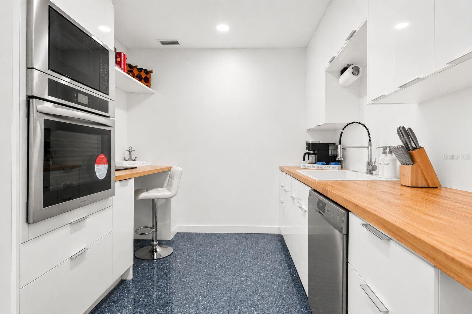SCULLERY PREP KITCHEN KEEPS MAIN KITCHEN CLEAR WHEN ENTERTAINING - 988 BLVD OF THE ARTS #109, SARASOTA