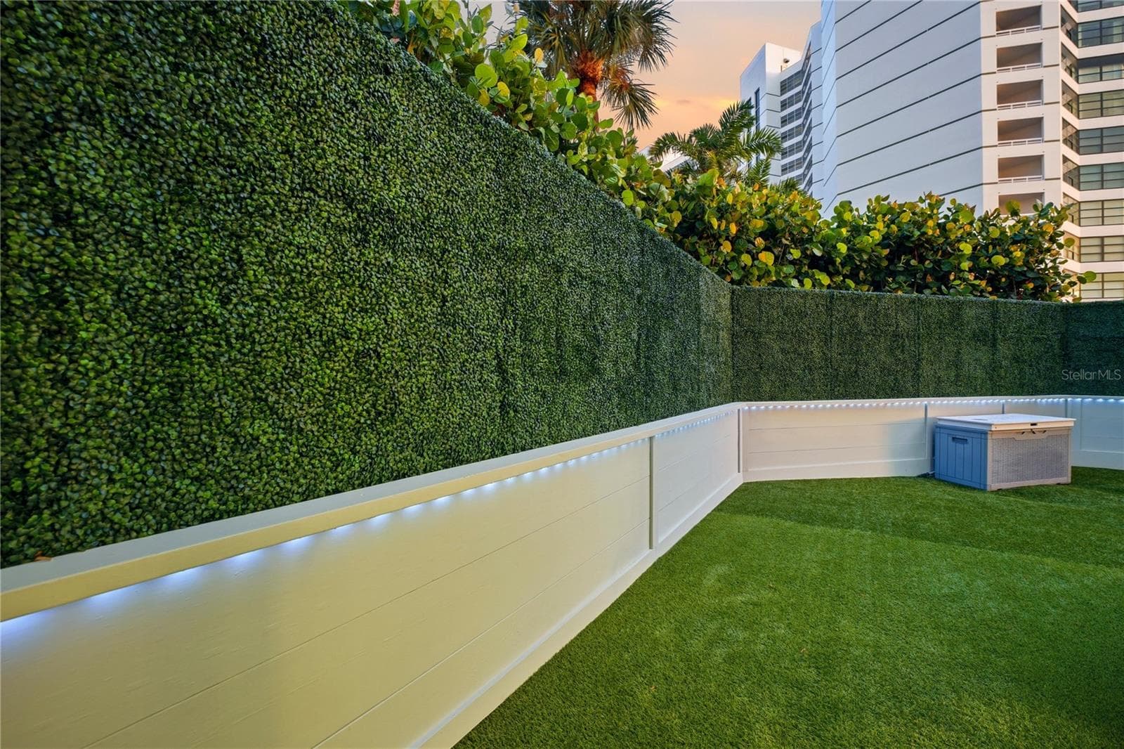 Privacy Hedges Surround The Back and Side Yards - 988 BLVD OF THE ARTS #109, SARASOTA