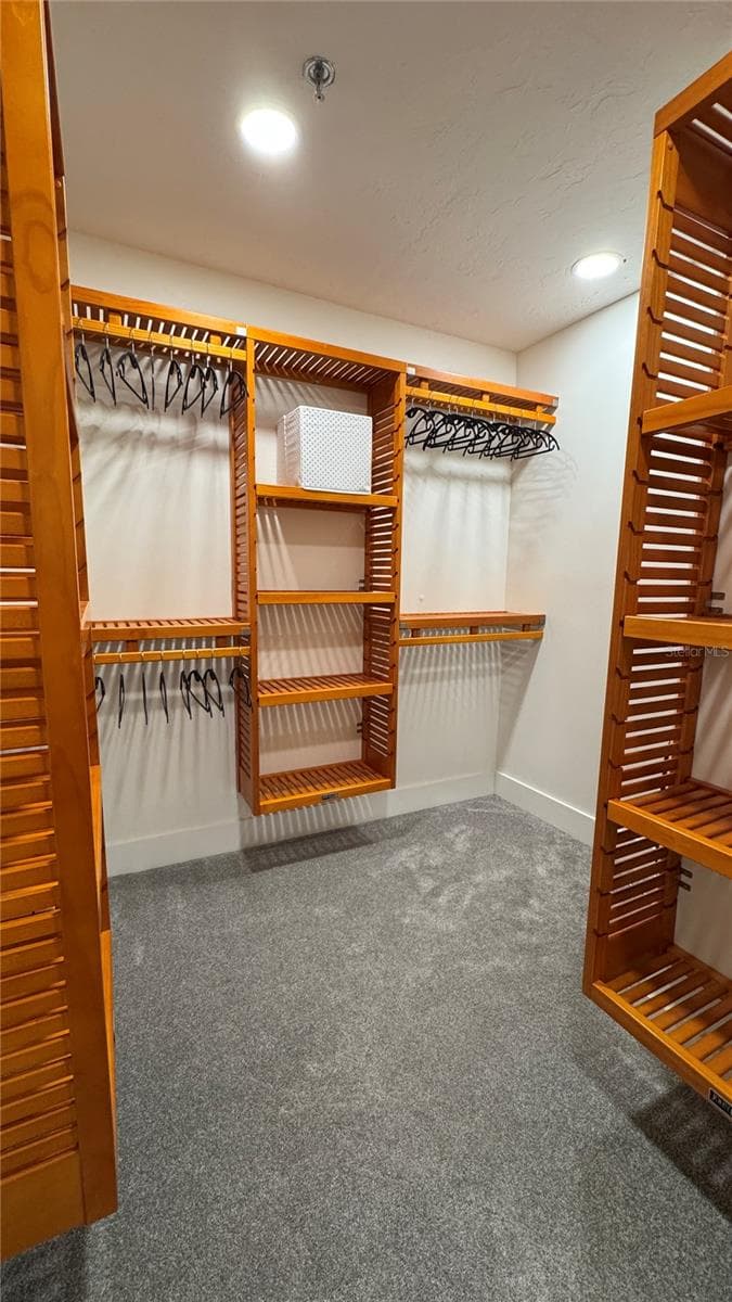 EXPANDED CLOSET IN PRIMARY SUITE - 988 BLVD OF THE ARTS #109, SARASOTA