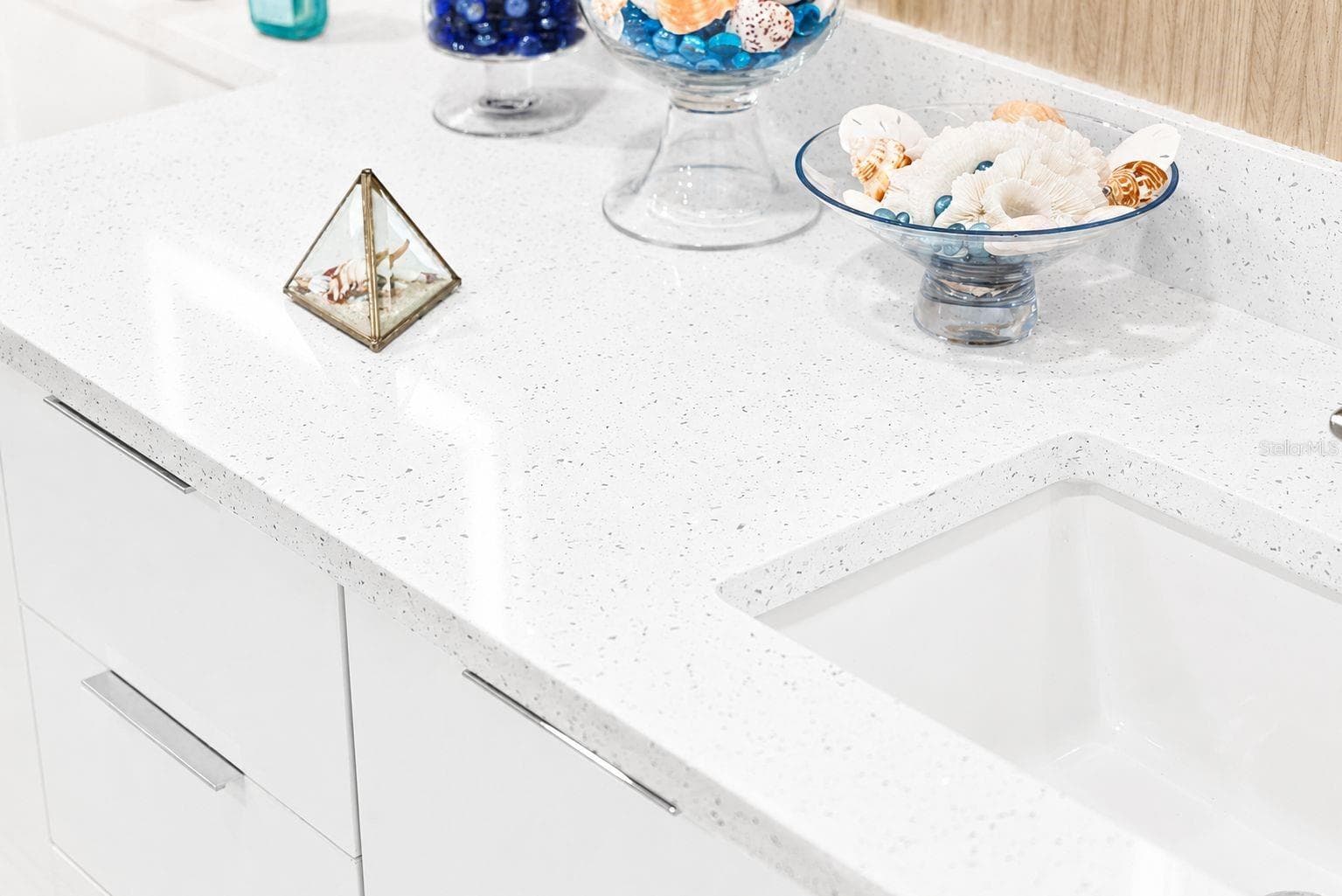 MATCHING QUARTZ COUNTER TOPS THROUGHOUT - 988 BLVD OF THE ARTS #109, SARASOTA