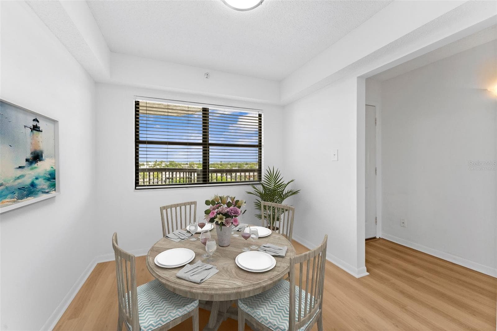 Virtually staged bonus room, suggested as a breakfast room, but could be a fantastic home office too. - 5400 PARK ST N #511, ST PETERSBURG