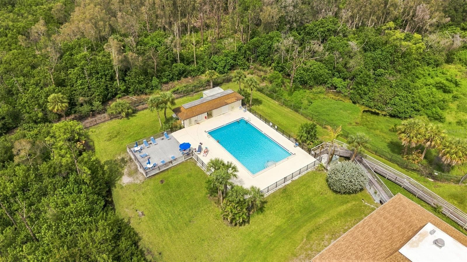 The pool is heated and perfect for laps! - 5400 PARK ST N #511, ST PETERSBURG