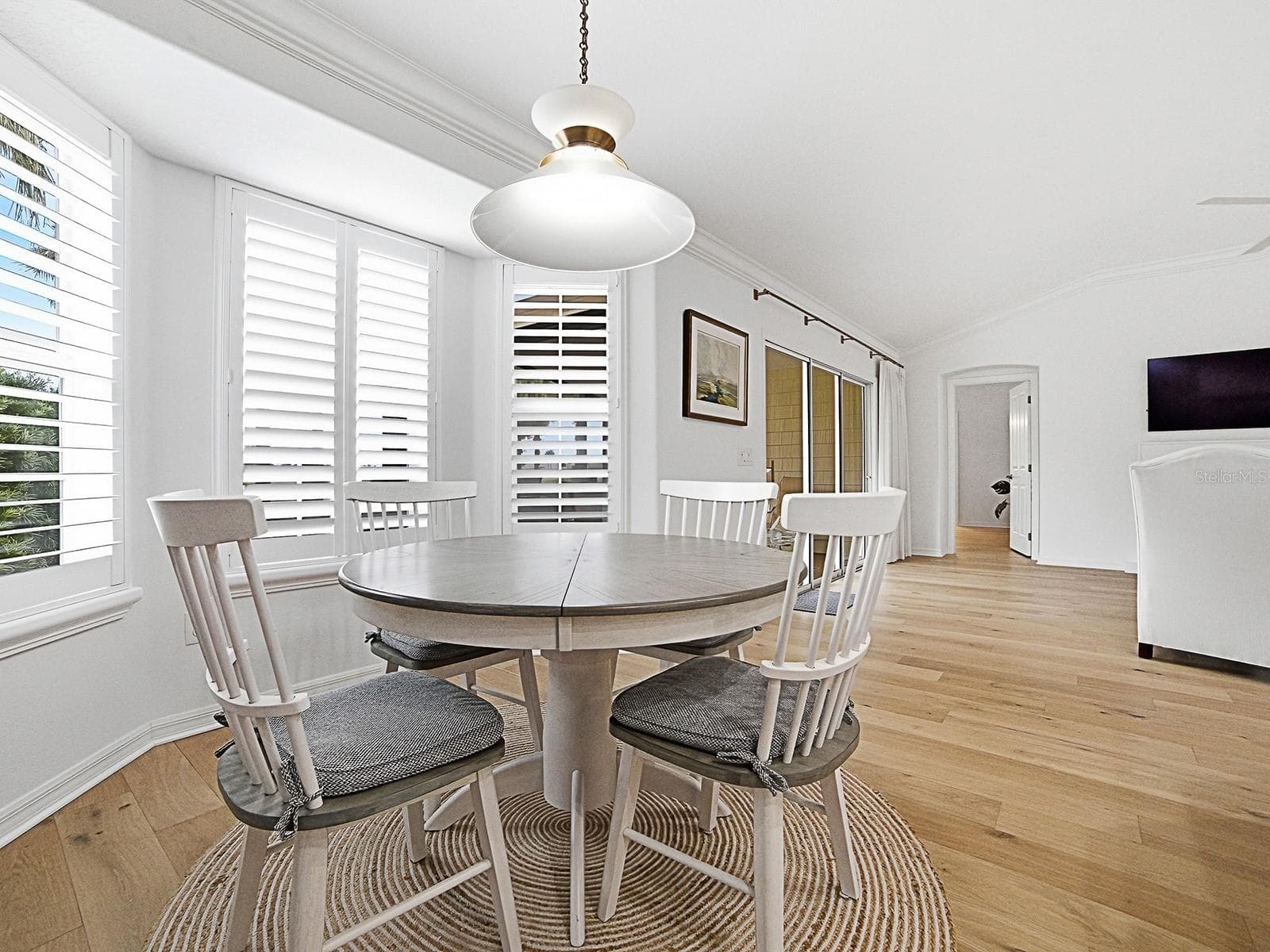 dinette w/ new plantation shutters - 2445 BUTTONWOOD RUN, THE VILLAGES