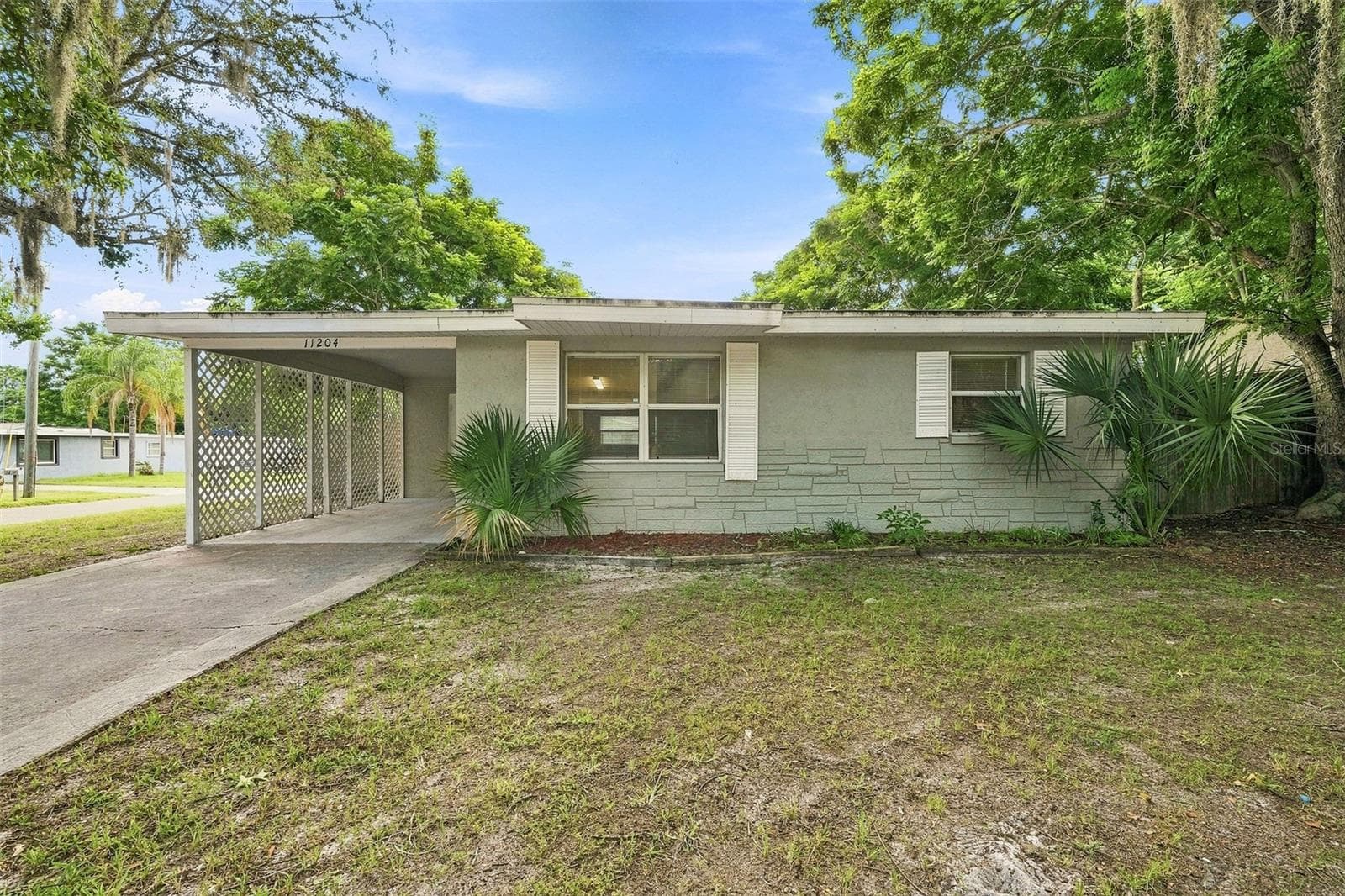 Single Family Residence at 11204 GRANT DR, PORT RICHEY, photo 2 of 16