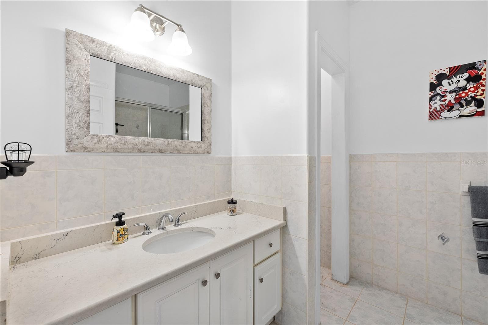 full bathroom number four in upstairs hallway serving bedrooms four and five - 12901 PHILLIPS RD, GROVELAND