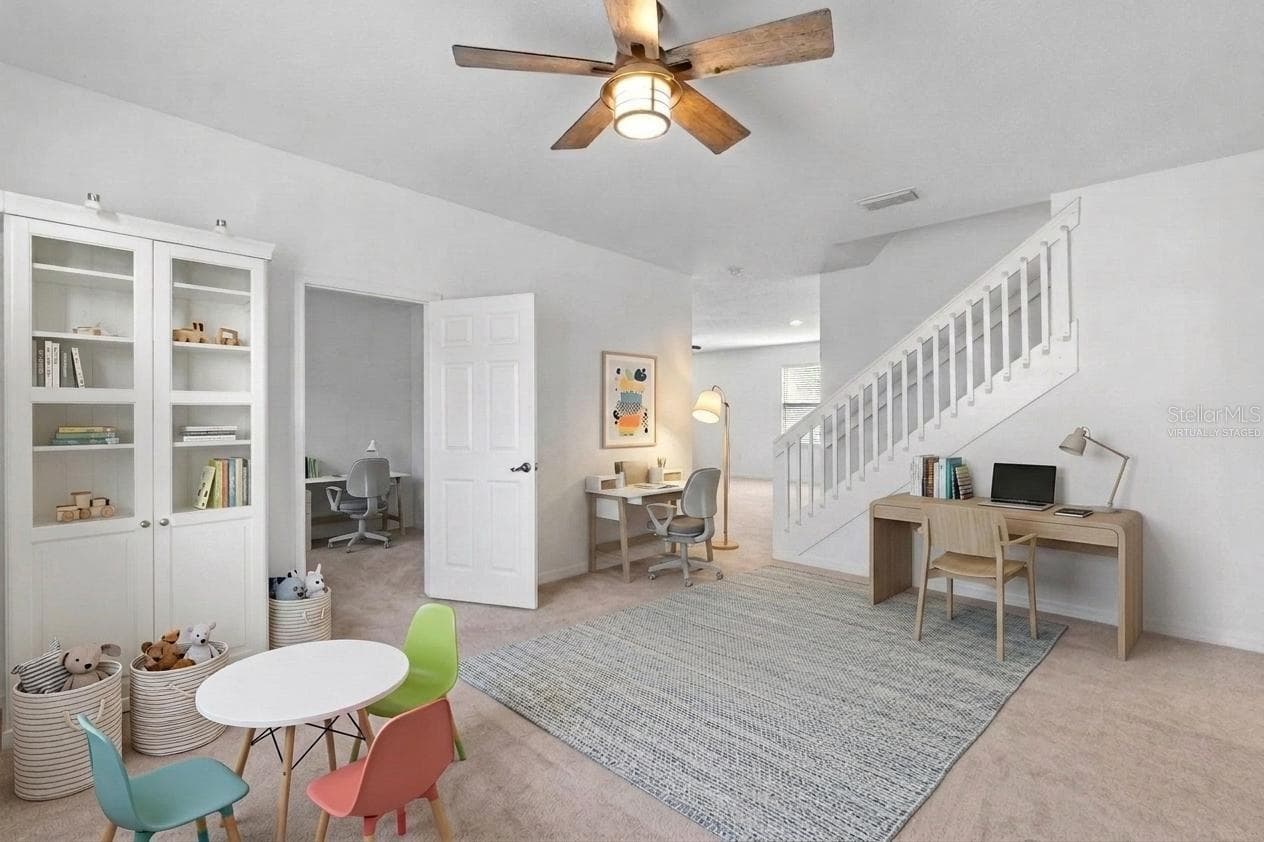 Formal Dining Room Virtually staged as Play or Study Room - 16021 CHAMPLAIN ST, CLERMONT