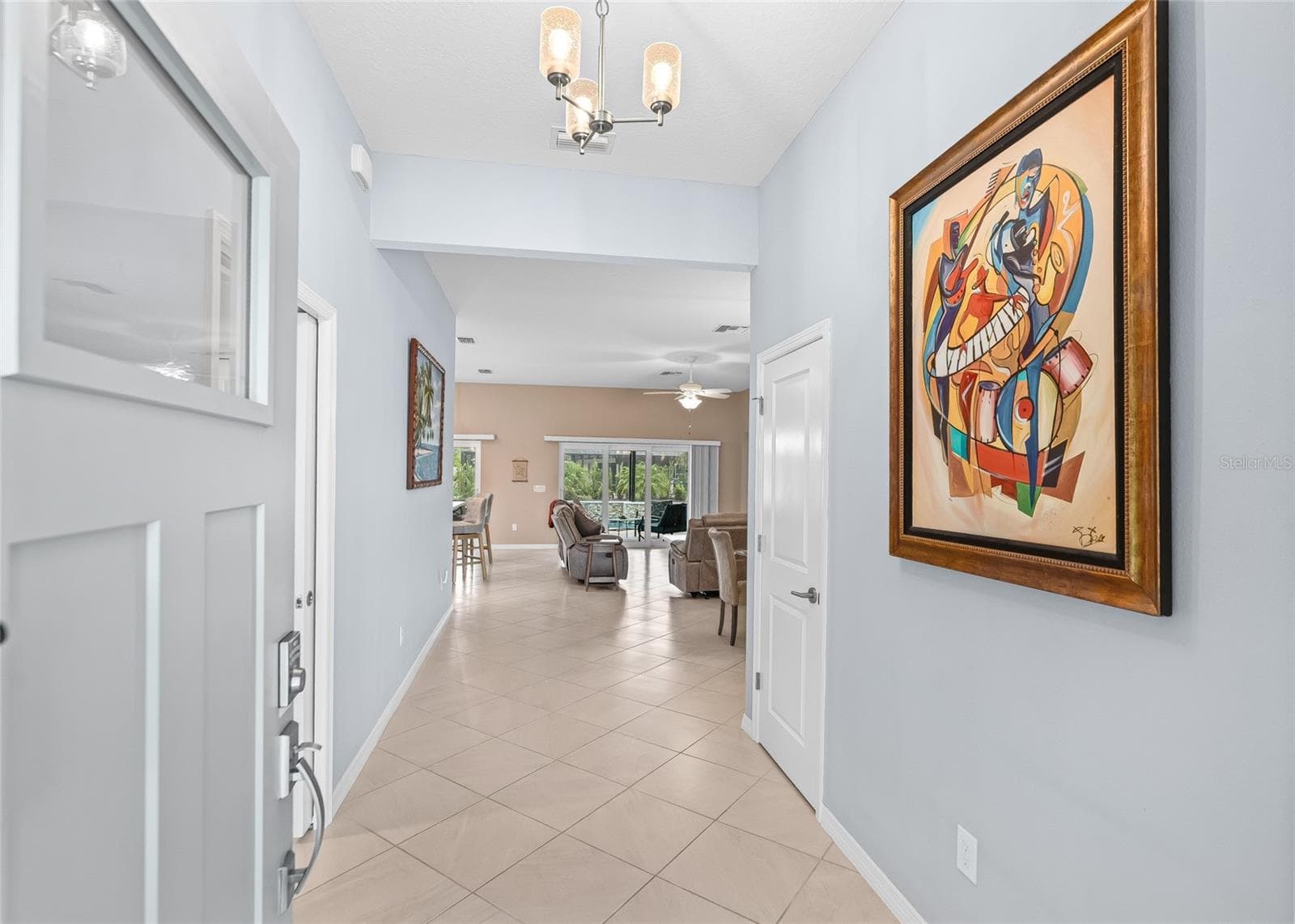 View from Front Door - Hallway with Coat Closet - 3146 JACQUELINE WAY, THE VILLAGES