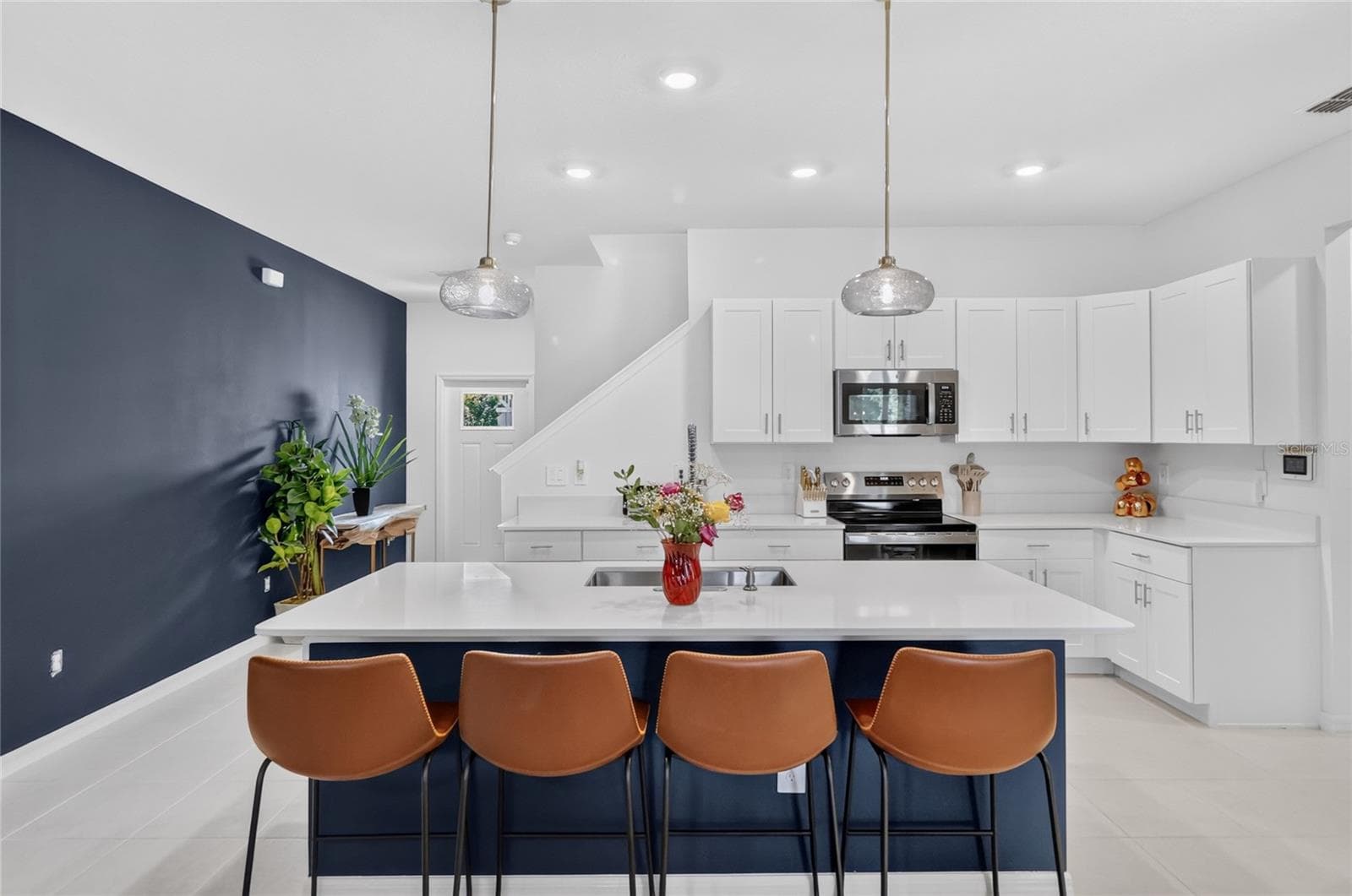 Love the blue accents to tie things together. - 36227 JOSEPH BLAKE ST, ZEPHYRHILLS