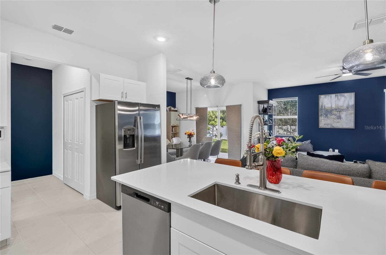 Looking from the kitchen to the dining room - 36227 JOSEPH BLAKE ST, ZEPHYRHILLS