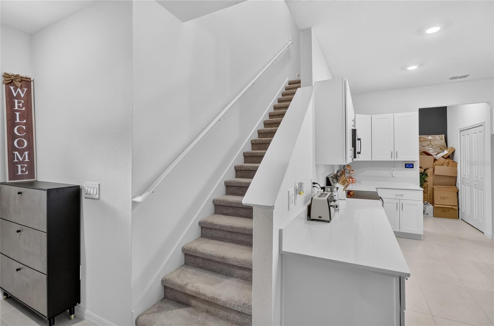 Headed upstairs to the bedrooms and loft - 36227 JOSEPH BLAKE ST, ZEPHYRHILLS