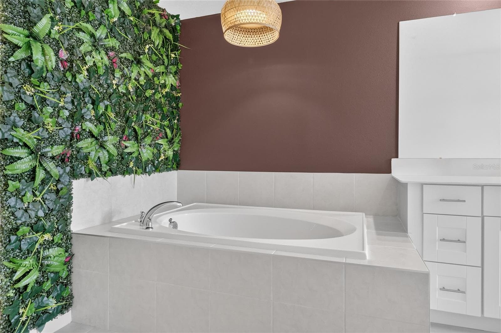 Soaking tub with updated lighting fixture - 36227 JOSEPH BLAKE ST, ZEPHYRHILLS