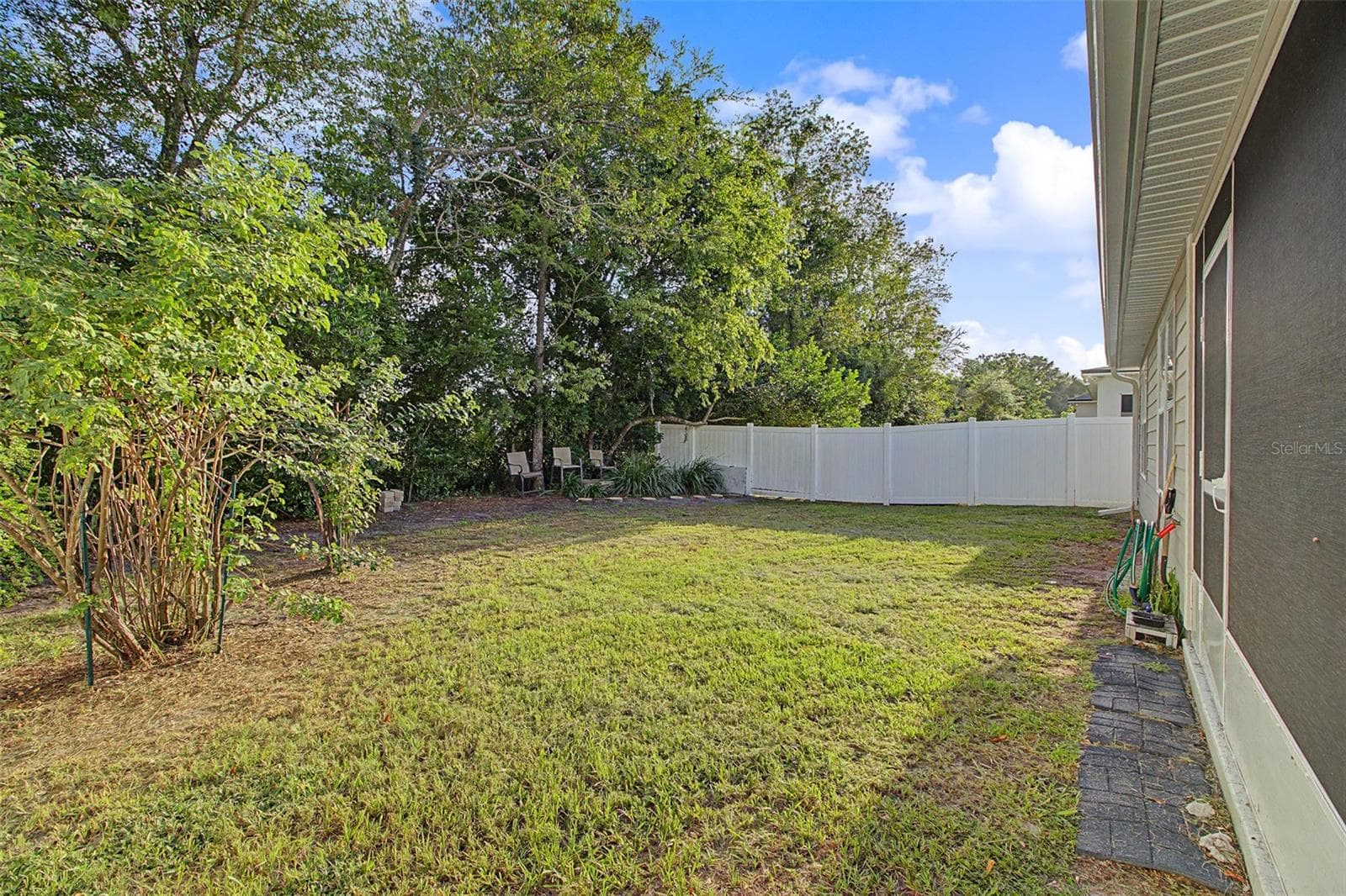 REAR YARD OFF LANAI - 25199 NW 8TH RD, NEWBERRY