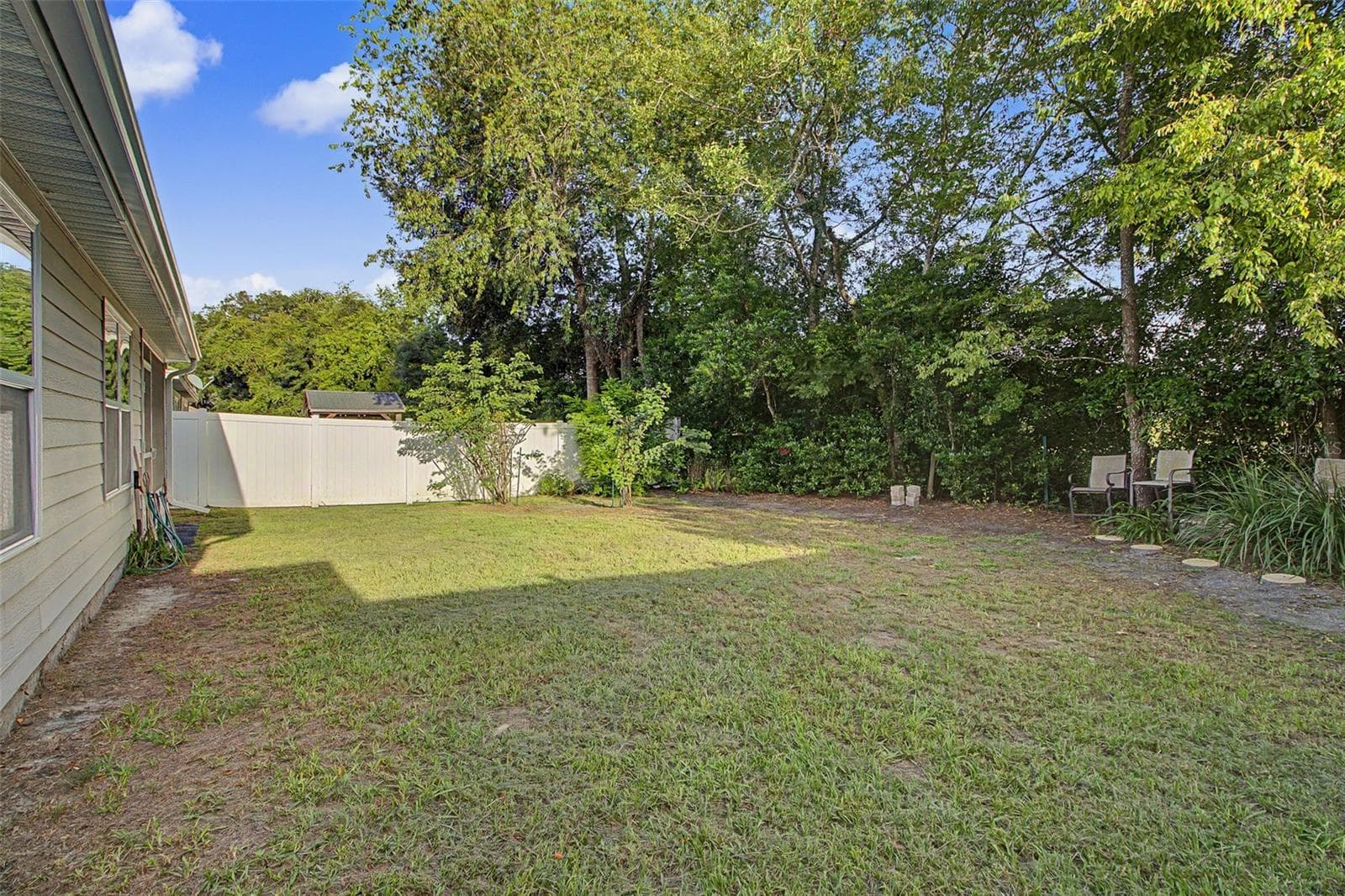 REAR YARD OFF LANAI - 25199 NW 8TH RD, NEWBERRY