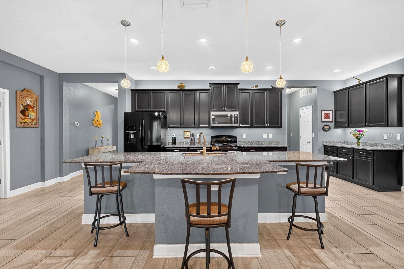 Kitchen with Oversized Island  and Built in Desk - 792 ROSEMARY CIR, BRADENTON