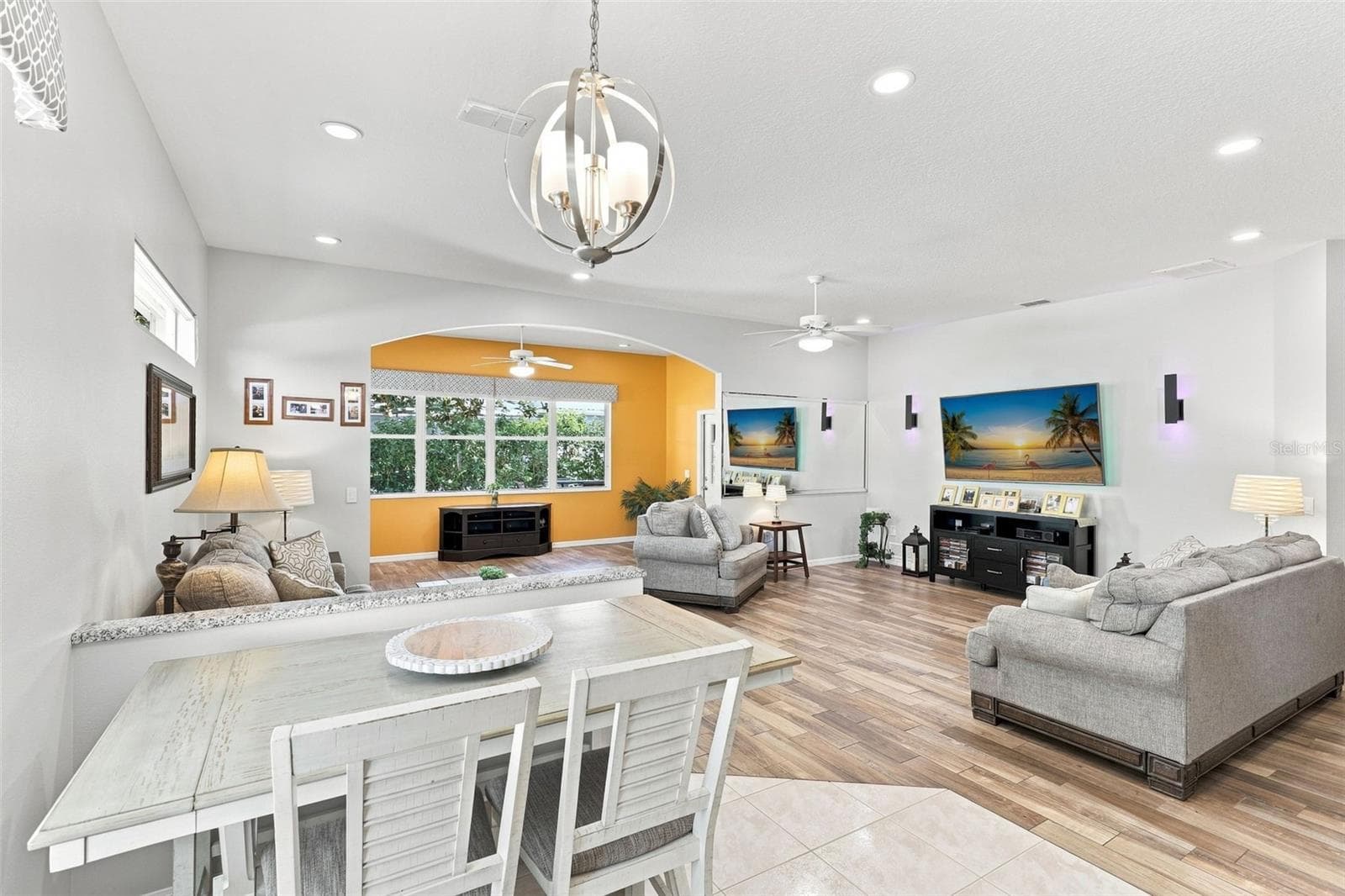 View from Kitchen into Living Room and Florida Room . - 367 FOXHILL DR, DEBARY