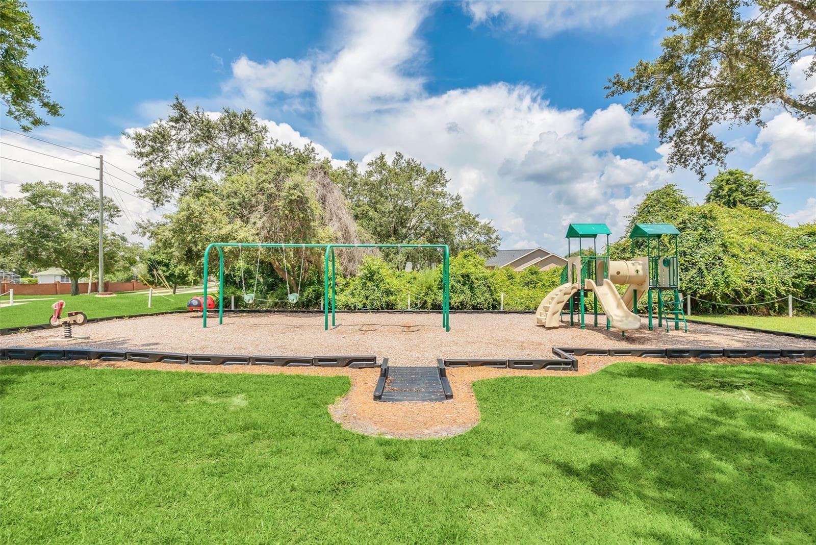 10 minute walk to the playground inside the community - 367 FOXHILL DR, DEBARY